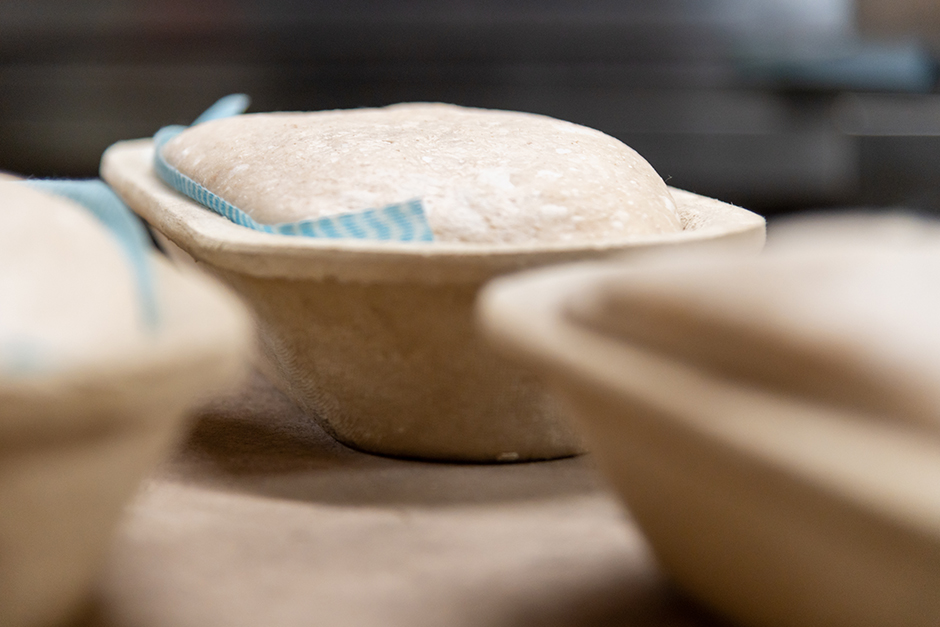 The dough sits in a proofing basket overnight to help its shape